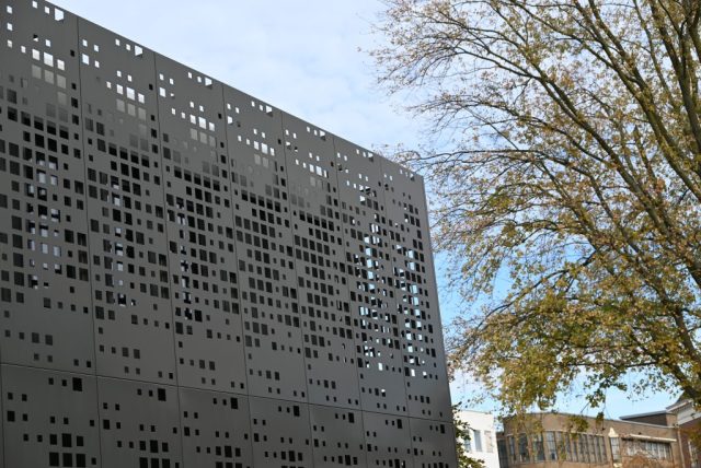 Photo of a parkinglot, with metal on the outside